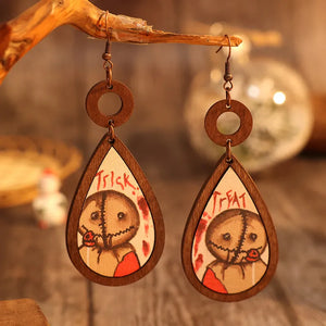 Sam Trick or Treat wood teardrop earrings with painted character and blood splatters.