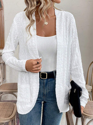 White open-weave embroidered cardigan with pockets, open front, and long sleeves.