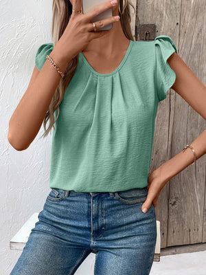 Pleated yoke flutter sleeve top in Gum Leaf green with a scoop neckline.