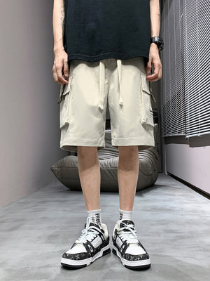 Men's apricot lightweight cargo shorts with drawstring waist and multiple pockets.