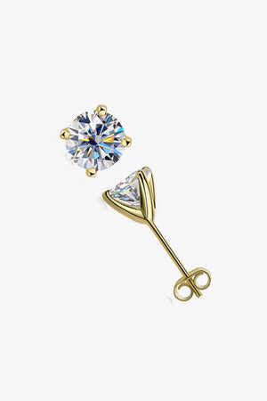 Gold moissanite solitaire stud earrings with sculpted setting and butterfly backs.