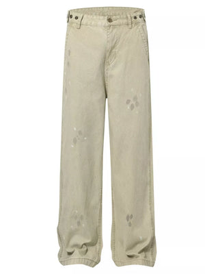 Loose fit sweatpants in beige with ink-splash detail and a comfortable casual style.
