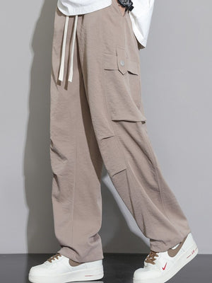 Men's relaxed fit cargo sweatpants in Dust Storm with drawstring waist and multiple pockets.