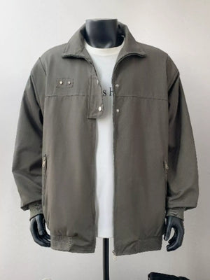 Green casual bomber jacket with zip pockets and buttoned chest detail