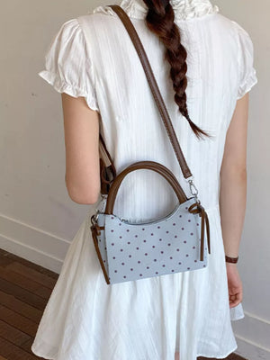 Polka Dot Mini Crossbody Bag in Blue, model styling view