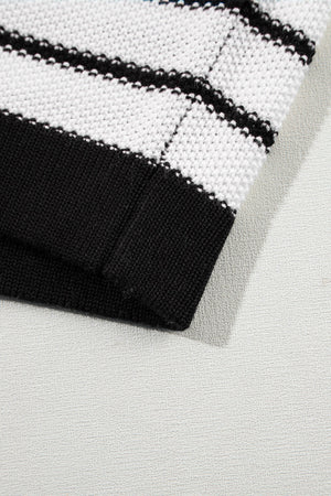 Black and white striped knit sweater with contrast trim detail