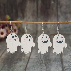 White acrylic dangle earrings with spooky ghost designs and alloy hooks.