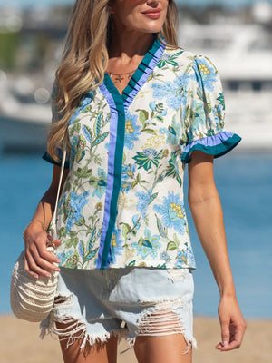 Floral frilled blouse with striped detail, short sleeves, v-neck, cotton fabric.