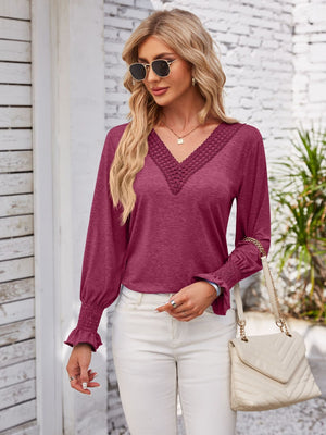 Lace trim V-neck blouse with blouson sleeves in dark green.