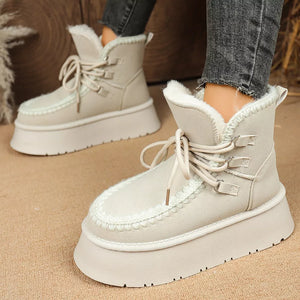 Suede lace-up platform ankle boots with fluffy lining and chunky sole.