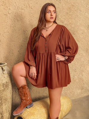 Caramel voluminous sleeve tiered romper with buttoned neckline and tie detail.