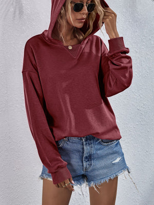 Boxy hooded sweatshirt in Wine with V-neck detail and split hem.