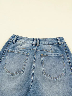 Vintage-inspired high-waisted seam jeans in light wash denim, featuring classic back pockets.