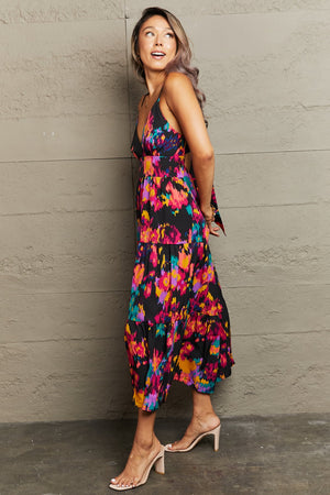 Abstract brushstroke midi dress with back tie and tiered skirt.