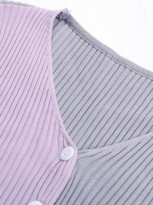 Colorblock ribbed cropped cardigan in lavender and gray with white buttons.