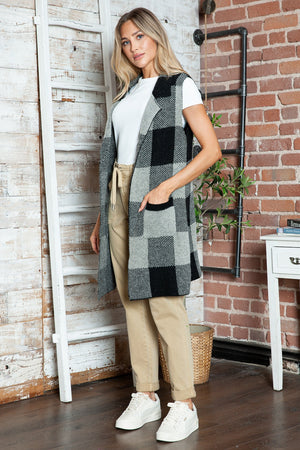 Black and gray checkered knit duster vest with pockets and a lapel.