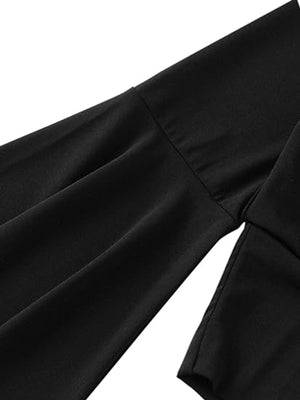 Black bell sleeve wrap top showing sleeve detail and fabric drape.
