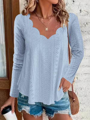 Light blue eyelet blouse with scalloped neckline and long sleeves