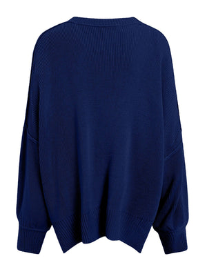Navy oversized ribbed knit sweater with drop shoulders and crew neck.