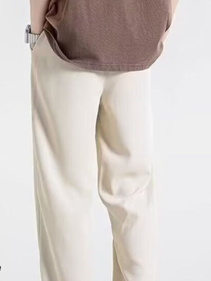 Men's off-white relaxed fit drawstring sweatpants with a casual, comfortable look.