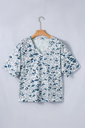 Camo print V-neck t-shirt with elbow sleeves and a chest pocket.
