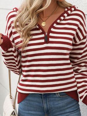 Burgundy and white striped knit hoodie with zip neck and hood.