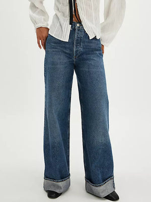Cuffed wide-leg denim trousers in light blue with a high waist and button fly.