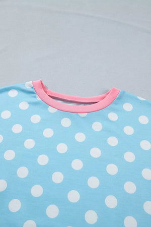 Pastel blue polka dot polyester pajama top with pink trim neckline