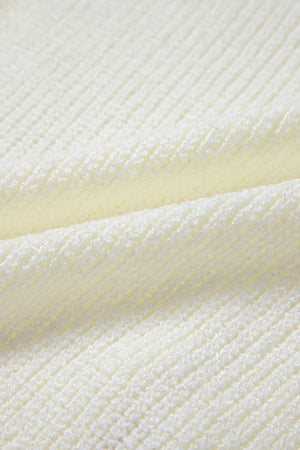 Beige textured knit tank top with a subtle pattern, acrylic fabric.