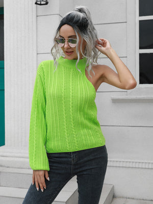 Neon green asymmetric cable knit sweater with one long sleeve and mock neck.