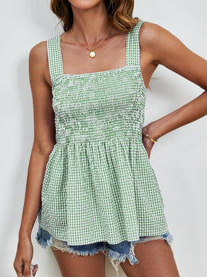 Light green gingham peplum tank top with smocked bodice and square neckline.