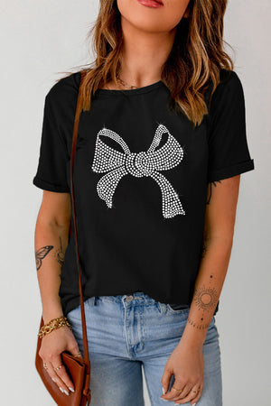 Black t-shirt with rhinestone bow graphic, crew neck, short sleeves.
