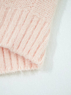 Pink acrylic knit sweater with ribbed texture detail