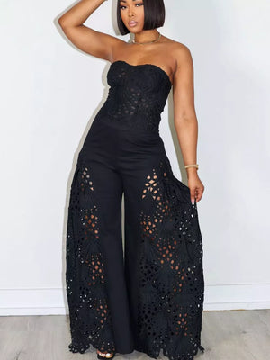 Black lace cutout tube top and wide-leg pants set with airy details.
