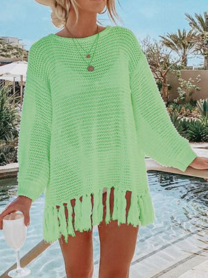 Neon Green open-knit acrylic beach cover-up with fringe hem and long sleeves.