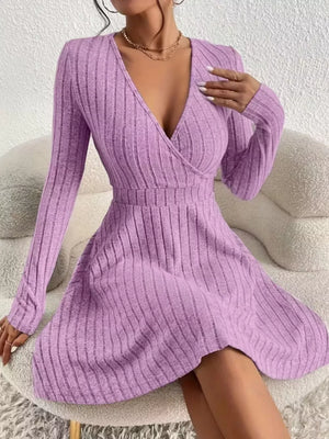Lavender ribbed wrap mini dress with long sleeves and a V-neck.