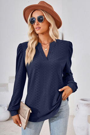 Dark Blue textured henley blouse with puff sleeves and V-neck.