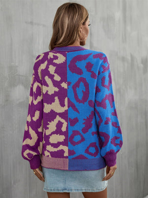 Split leopard knit sweater with statement balloon sleeves in blue/green and purple/apricot acrylic.