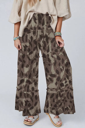 Camo print wide-leg maternity pants with ruffled hem and drawstring waist.