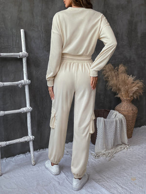 Cream ribbed knit cargo co-ord set with drawstring waist and side cargo pockets.