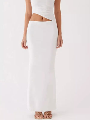 White one-shoulder cutout maxi maternity dress with a ruched bodice detail.