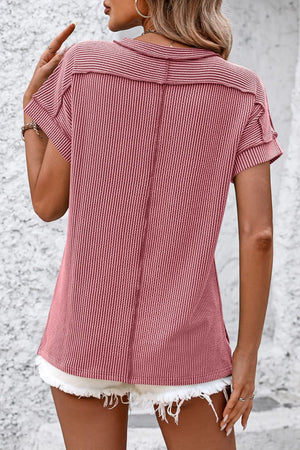 Deep Rose vertical ribbed tunic tee with short sleeves and split hem detail.