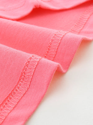 Pink cotton toddler t-shirt showing hem detail with double stitching.
