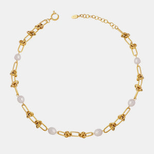 Gold linked pearl knot collar necklace with toggle clasp