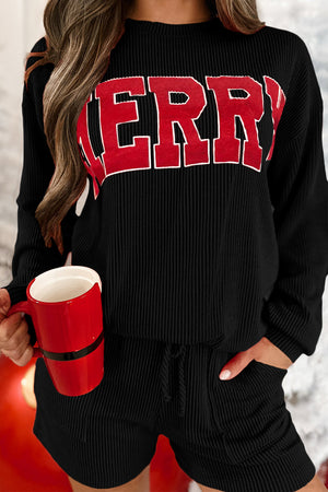 Black ribbed lounge set with "Merry" graphic, drawstring shorts and long sleeves.