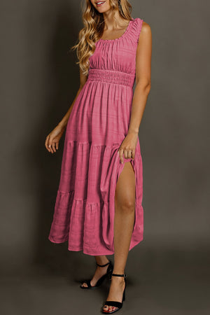 Deep rose smocked midi dress with tiered skirt and thigh-high slit.