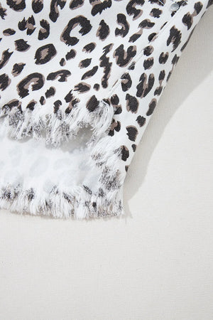 Leopard print denim shorts with frayed hem detail
