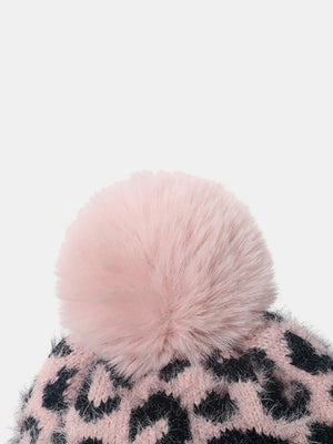 Blush pink leopard print knit beanie with a fluffy pink pom pom.