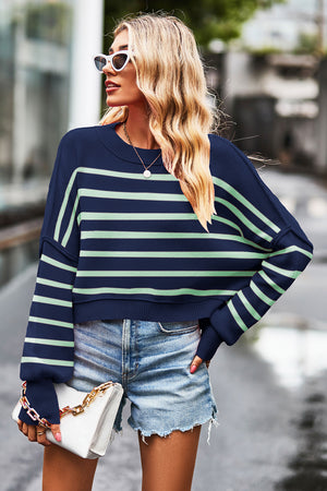 Navy and mint striped knit crewneck sweater with a boxy fit.