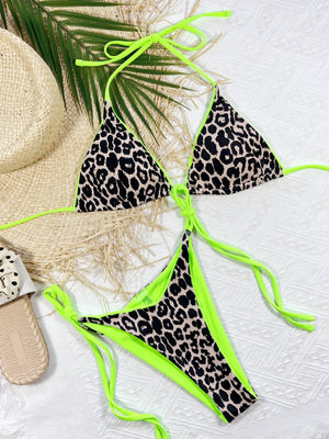 Leopard print tie-side bikini set with neon green lining and ties.